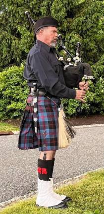 Bagpiper at dusk at Crystal Springs Golf Resort in Hamburg. (Photo by Bill Truran)