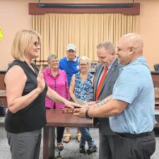 <b>Jodi White Bearstler is sworn in as a member of the Vernon Historical Preservation Commission by Mayor Anthony Rossi. Holding the Bible is commission vice chairman Ariel Lazo. In back row, from left, are Cynthia Bogdon, chairman Harris Salomon and Lisaann VanBlarcom Permunian. (Photo provded)</b>