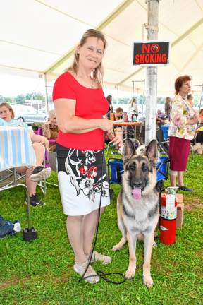 <b>Christine Yozgatlioglu of Branchburg with Lilah, a German Shepherd.</b>