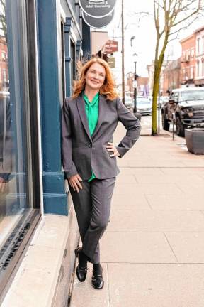 Community planner Jessica Caldwell in front of her business, J. Caldwell &amp; Associates, 145 Spring St., Newton. (Photos provided)