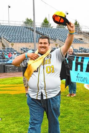 Brandon Bordt wears the ribbon around his neck.