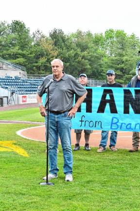 Jim Fitzpatrick speaks at the ceremony. He was one of a group who helped raise money to provide a new mobile home for Brandon Bordt and his father, Jim, in Lafayette.