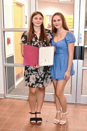 Magdalen and Olivia Costello run the Weekend Bag program, which provides meals to needy students.