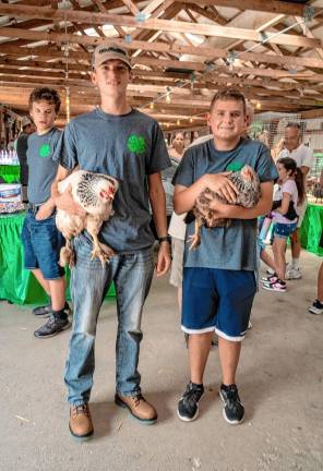 <b>Douglas Demarco and Ethan Westla with Fuzzy. (Photo by Nancy Madacsi)</b>