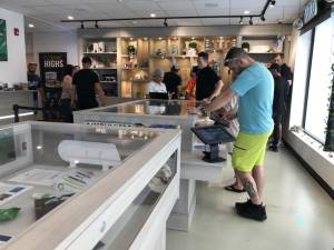 CA1 Customers at Mountain View Farmacy in Newfoundland order on electronic tablets by the display cases. It is the first state-licensed cannabis retailer to open in West Milford. (Photos by Kathy Shwiff)