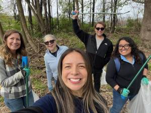 Local First Hope Bank employees cleaning up the community. Photo provided.