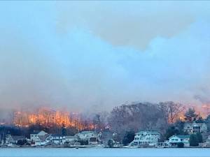 Flames are visible on the east shore of Greenwood Lake about 5 p.m. Sunday, Nov. 10. (Photo by Denise von Wilke)