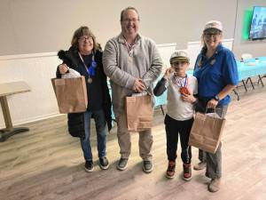 <b>BC1 From left, Rose McLaughin wins first place, Robert Houdershieldt takes third, and Sal and Christy Guccione place second in the Everything Bacon Contest on Sunday, Jan. 12 at Veterans of Foreign Wars Wallkill Valley Post #8441 in Vernon. (Photos by Maria Kovic)</b>