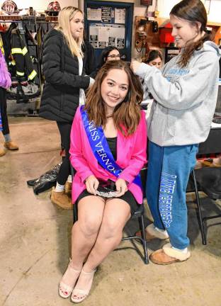 <b>Miss Vernon Mackenzie Rivier has strands of fairy hair attached by a Vernon Township High School cosmetology student.</b>