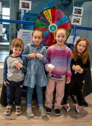 Ethan Gast, Teegan March, Gianna Gast and Gabriella Gast with snowcones.