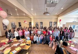 Local breast cancer survivors celebrate during a previous Survivor Event at Project Self-Sufficiency. (Photo provided)