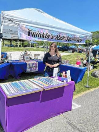 Valene Flynn of Twinkle’s Hair Sprinkles sells hair tinsel among other items. (Photo by Daniele Sciuto)