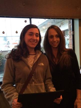 Madison Lutchko, a senior at Vernon High School, and the winner of the Best in Show, with Mitzi Campbell.