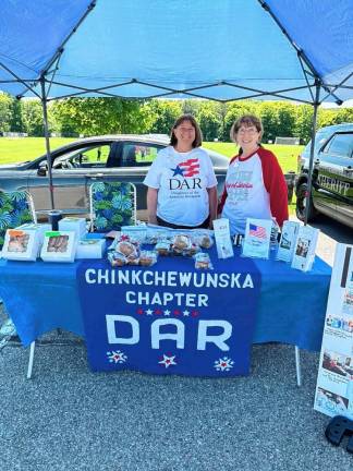 Kathy Wetland and Kathy Nevard Cook of the Chinkchewunska Chapter, National Society Daughters of the American Revolution. (Photo by Daniele Sciuto)