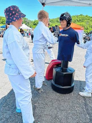 Jacob Ferrarella of Warrior’s Path Martial Arts, an Isshinryu Karate<i> </i>school in Sussex, demonstrates moves on ‘Bob.’ (Photo by Daniele Sciuto)