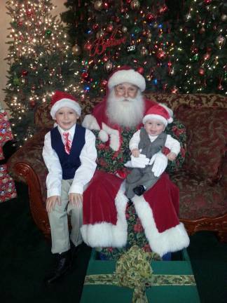 Submitted by: Sharon Wareka of Hamburg, N.J. &quot;Devin Lewis W. 8 years old and Darren Xavier W. 6 months old with the real Santa 2013&quot;