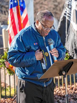 The Rev. Ben Williams, pastor of St. Thomas the Apostle in Oak Ridge and St. John Vianney in Stockholm, speaks during the ceremony. (Photo by Nancy Madacsi)