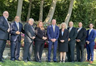 <b>Full- and part-time staff of Ferguson Funeral Home. (Photos provided)</b>