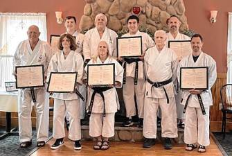 In front row, from left, are Ed Lyden, CJ Hintzen, Alicia Warner, Sensei Chuck Ercolano and Nick Vigiletti. In back row, from left, are Jake Remmington, Sensei Tom Shull, Braden Rosario and Scott Wolven. (Photo provided)