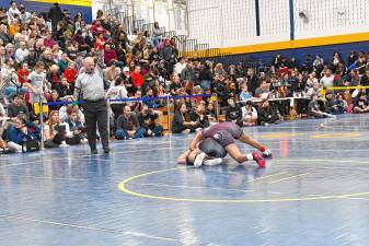 <b>Amanda Scarpati of Lakeland Regional High School and Kameko Sibblies of Newton/Kittatinny compete in the 109-pound weight class in the NJSIAA North Jersey, Section 1, District/Region championships Sunday, Feb. 23 at Vernon Township High School. (Photos by Maria Kovic)</b>