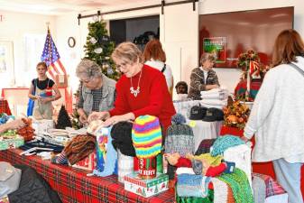 <b>Women shop at the Christmas Bazaar on Saturday, Nov. 9 at Our Lady Queen of Peace Church in Branchville. (Photos by Maria Kovic)</b>