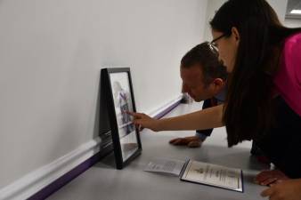 Rep. Josh Gottheimer, D-5, looks at an entry to the Congressional Art Competition. (Photos provided)