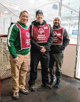 Ramapo High School hockey coaches David Chen, Michael McLachlan and John Russo.