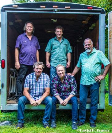 Top, from left, are From Good Homes band members Dan Myers, Todd Sheaffer and Jamie Coan. Seated, from left, are Patrick Fitzsimmons and Brady Rymer.