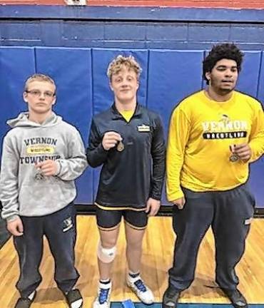 <b>From left are Vernon wrestlers Mike Ivancich, Gavin Pych and Zyon Taylor. At the Lenape Valley Holiday Tournament, Pych placed first and Ivancich and Taylor each took second place.</b>