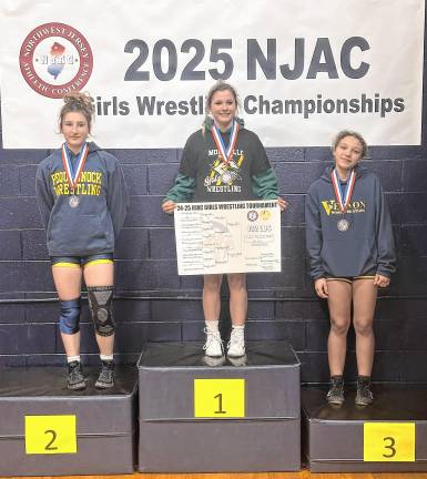 <b>Melodie Guzik-Upchurch places third in the 134-pound weight class.</b>