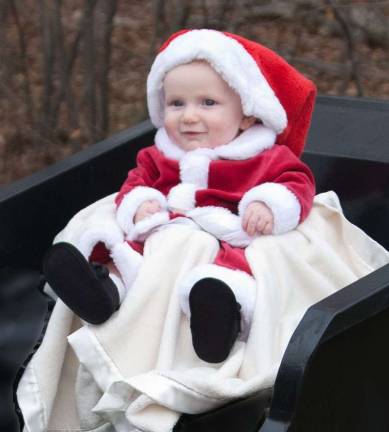 Submitted by: Christine Schouten of West Milford, N.J. &quot; Kyle Johan's first Sleigh Ride. Our precious little Santa on his own Christmas sleigh.&quot;