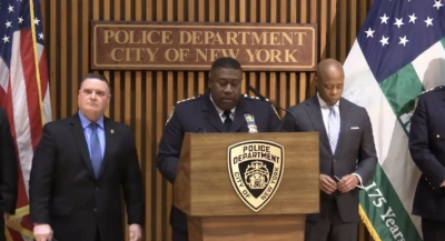 Chief of Department Jeffrey Maddrey, (at mic) at a press conference with Mayor Eric Adams (right) and chief of detectives James Essig. Photo: NYPD twitter.