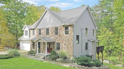 Custom-built colonial has room to spare