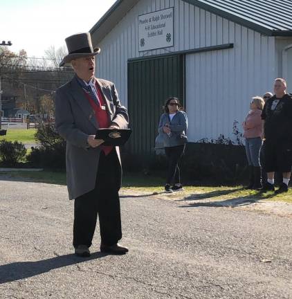 U.S. Marine Corps veteran William Joseph, the Sussex County town crier, speaks at the beginning of the parade.