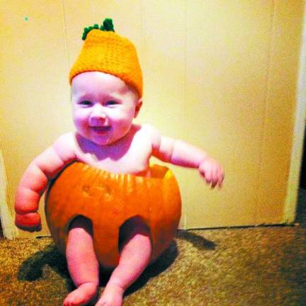 Submitted by Debbie Macaluso of Sussex, N.J. &quot;Our Grandson Evan enjoying the pumpkin carving season.&quot;