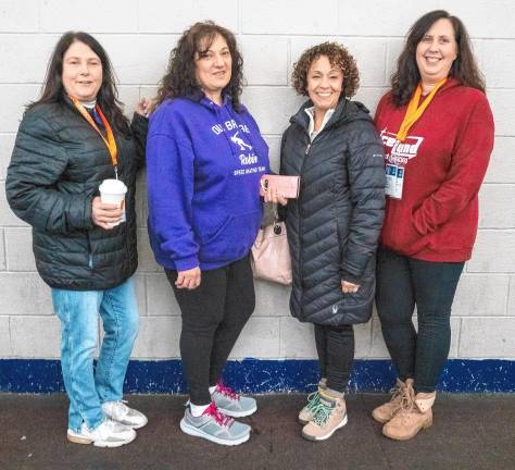 Laura Cioffi, Rachelle Zeluff, Claudia Puccio and Lisa Hodnett have children competing in the Special Olympics.