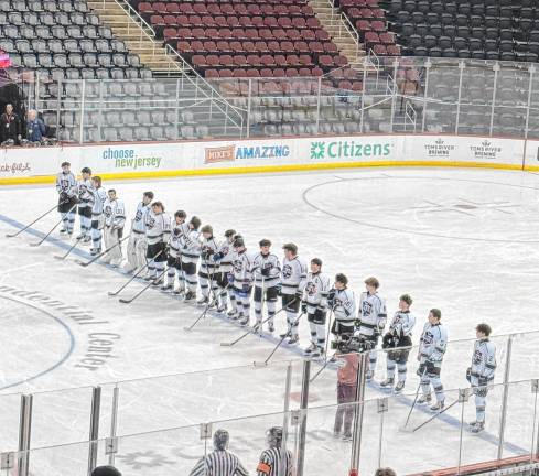 The Kinnelon/Jefferson/Sparta ice hockey team lines up Monday, March 10 at the Prudential Center in Newark.