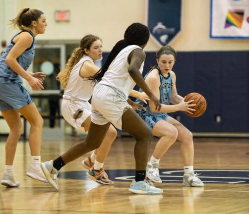 Sparta's Ally Sweeney has the ball. She had 12 points, nine assists and two rebounds in the finals.