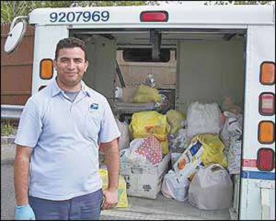 Postal supervisor applauds all who helped gather and deliver food