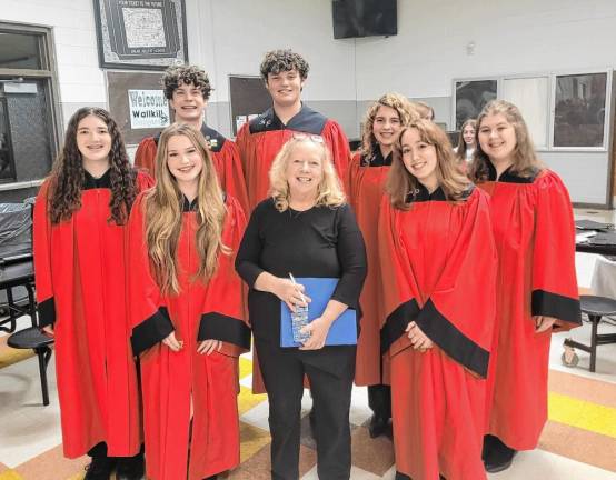 <b>High Point Chorus members who sang in the All-Sussex County High School Chorus and Band Concert on Nov. 16 are, from left, Breelagh Colarusso, Leah Klimas, Angus Schmitt, Chales Yaneko, choral conductor Lorraine Lynch, Grace McEvoy, Sophia Fiorentino and Gabby Avery Horlacher.</b>