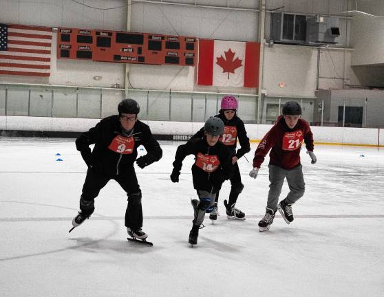 Speed skaters Christopher McMullen, Avery Richardson, Kristina Pkhrikyan and Thomas Edward Hodnett.