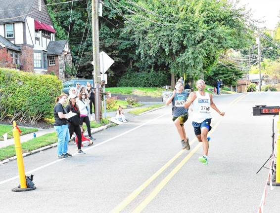 Runners approach the finish line.