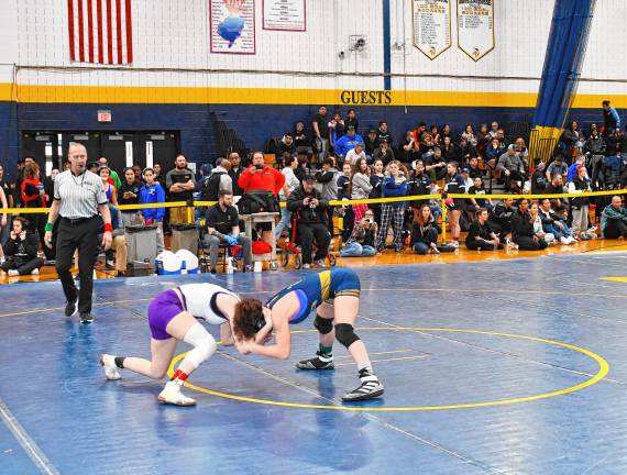 <b>Emilia Tylki of Garfield and Kate Machleder of Old Tappan compete in the 114-pound weight class.</b>