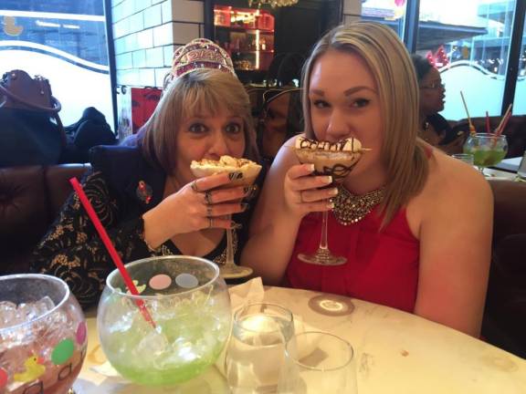 Brenda Schultz, left, with her daughter at a previous Leap Year birthday.