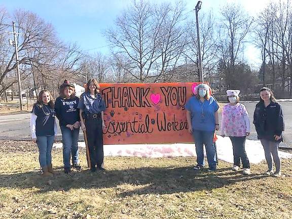 The children decorated a “thank you” sign (Photo provided)