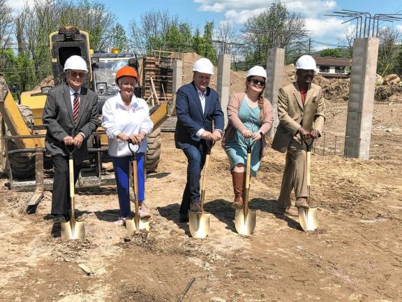 From left are Patrick Rizzuto, president of the Vernon Township Council; Paula O’Neill, chief executive of OneKey and the O’Neill Group; Mayor Anthony Rossi; Donelle Bright, the township’s chief financial officer; and former Mayor Howard Burrell at a ceremonial ground-breaking Wednesday, May 8.