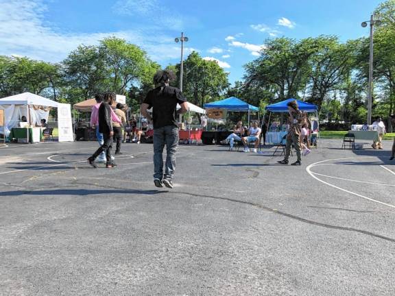 Performers included a young hip hop group.