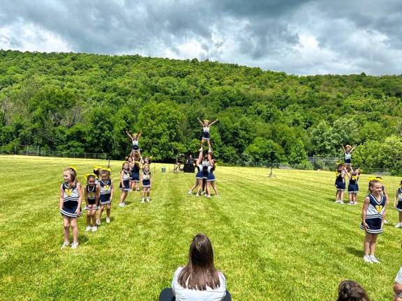 The Vernon Youth Cheerleaders perform.