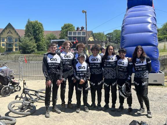 From left are Gears in Action (GIA) team members Johnathan Yorke, Ethan Finn, Connor Parmelee, Tim Faucette (front), James Bodino, Matthew Keegan, Sahil Bansal and Emma Jarl. (Photo provided)