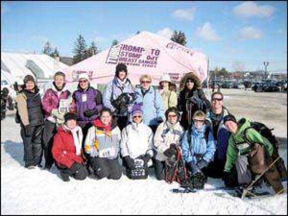 School employees snowshoe against cancer